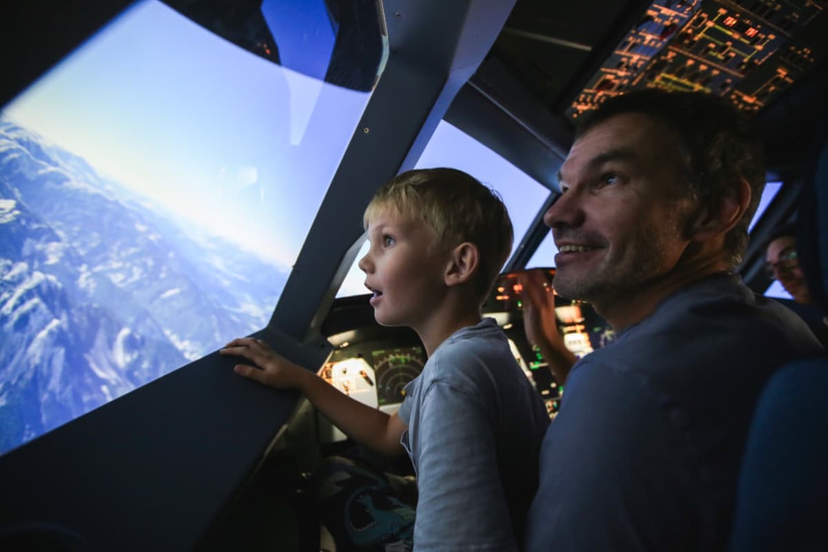 Child flying the simulator